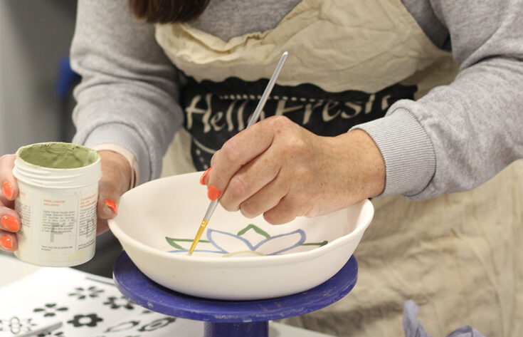 Photograph of a student making pottery