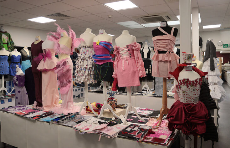 Photograph of dresses created by Aquinas students